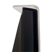 A close-up shot from above shows the top corner of a clear acrylic TV screen protector resting on the top edge of a black flat-screen television. The protector has a rounded corner and slightly overhangs the top and side of the TV. The texture of the back of the TV is visible. The background is plain white.